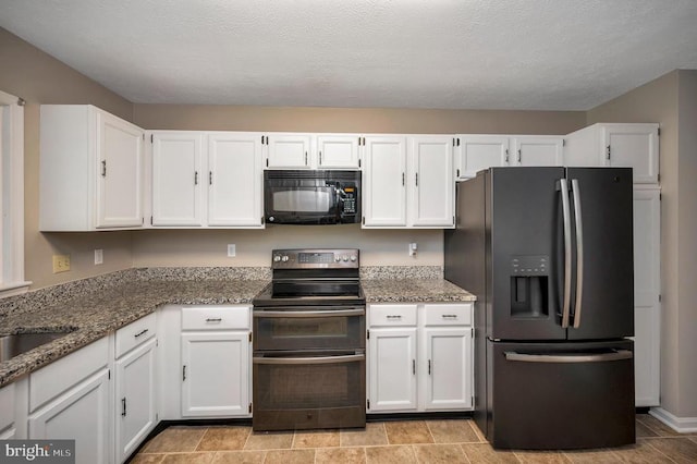 141 Eagle Ct, Locust Grove, VA 22508 - kitchen featuring stainless steel appliances, white cabinetry, stone countertops, and a sink
