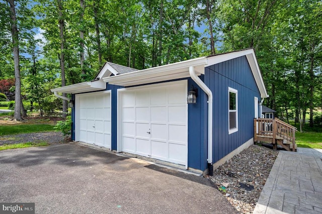 141 Eagle Ct, Locust Grove, VA 22508 - detached garage featuring view of scattered trees
