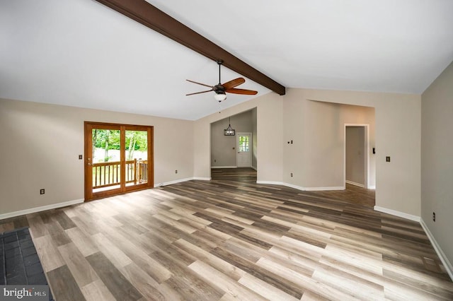 141 Eagle Ct, Locust Grove, VA 22508 - unfurnished living room with ceiling fan, wood finished floors, and baseboards