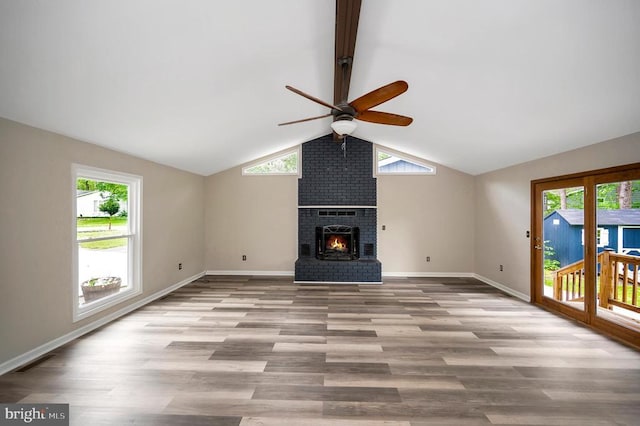 141 Eagle Ct, Locust Grove, VA 22508 - unfurnished living room featuring a ceiling fan, wood finished floors, plenty of natural light, and baseboards
