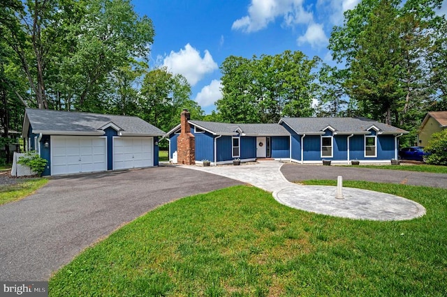 141 Eagle Ct, Locust Grove, VA 22508 - single story home featuring a front yard, a chimney, and an outbuilding