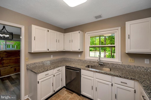 141 Eagle Ct, Locust Grove, VA 22508 - kitchen with black dishwasher, a sink, white cabinets, and stone countertops