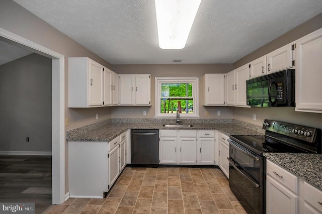 141 Eagle Ct, Locust Grove, VA 22508 - kitchen featuring black appliances, a sink, white cabinetry, and a textured ceiling
