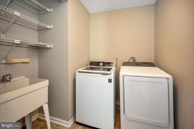141 Eagle Ct, Locust Grove, VA 22508 - washroom with washer and clothes dryer and baseboards