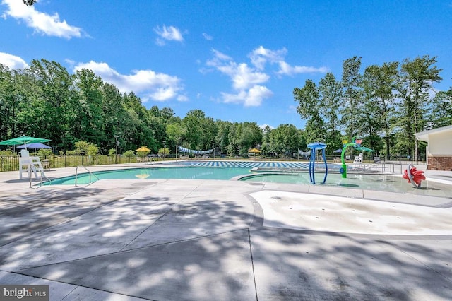 141 Eagle Ct, Locust Grove, VA 22508 - community pool featuring a patio and view of scattered trees