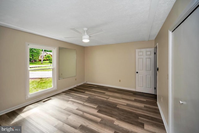 141 Eagle Ct, Locust Grove, VA 22508 - spare room with baseboards, a textured ceiling, ceiling fan, and wood finished floors