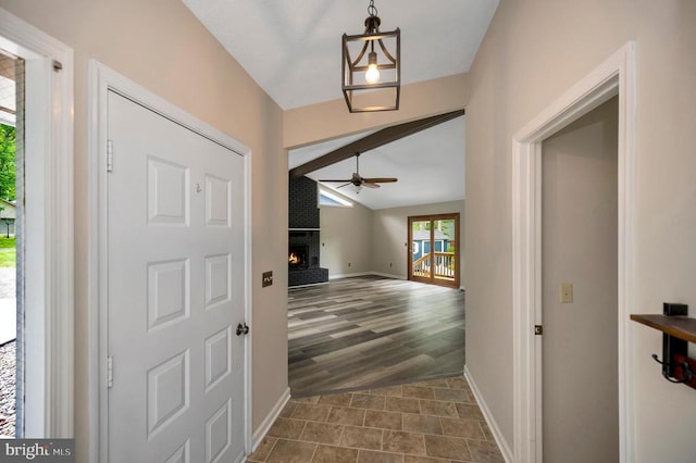 141 Eagle Ct, Locust Grove, VA 22508 - foyer entrance featuring ceiling fan, baseboards, and a brick fireplace