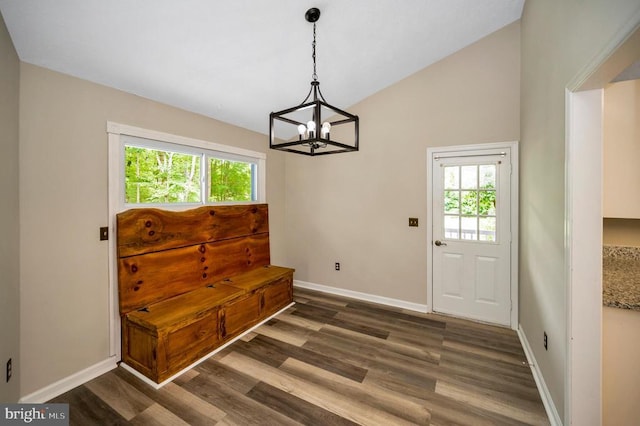 141 Eagle Ct, Locust Grove, VA 22508 - doorway to outside with a chandelier, dark wood-style floors, baseboards, and vaulted ceiling