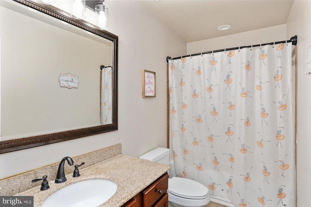 5930 Copper Mountain Dr W, Spotsylvania, VA 22553 - bathroom with toilet, vanity, and curtained shower