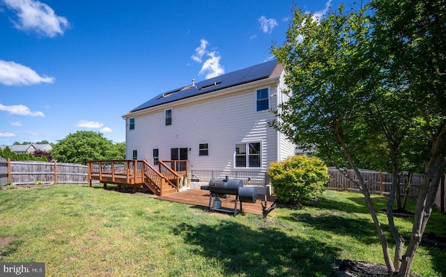 5930 Copper Mountain Dr W, Spotsylvania, VA 22553 - rear view of house with a deck, solar panels, and outdoor lounge area