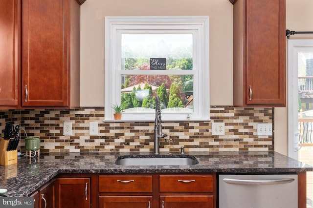 5930 Copper Mountain Dr W, Spotsylvania, VA 22553 - kitchen with stainless steel dishwasher, tasteful backsplash, plenty of natural light, and dark stone countertops