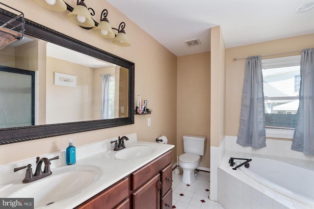 5930 Copper Mountain Dr W, Spotsylvania, VA 22553 - bathroom with toilet, a garden tub, tile patterned floors, double vanity, and baseboards