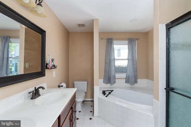 5930 Copper Mountain Dr W, Spotsylvania, VA 22553 - bathroom featuring tile patterned flooring, a bath, toilet, and healthy amount of natural light