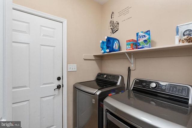 5930 Copper Mountain Dr W, Spotsylvania, VA 22553 - clothes washing area with washer and dryer