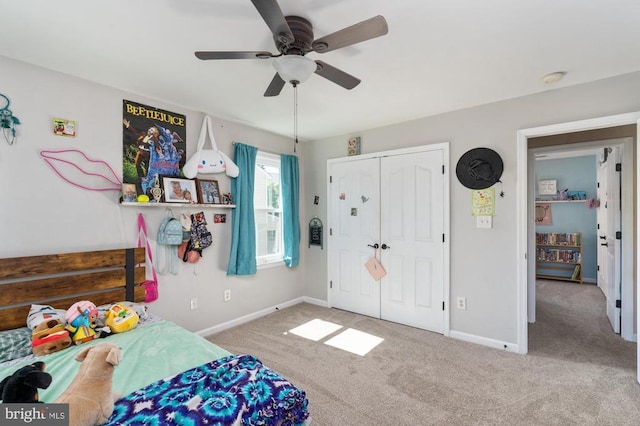 5930 Copper Mountain Dr W, Spotsylvania, VA 22553 - bedroom featuring carpet flooring, baseboards, a closet, and ceiling fan