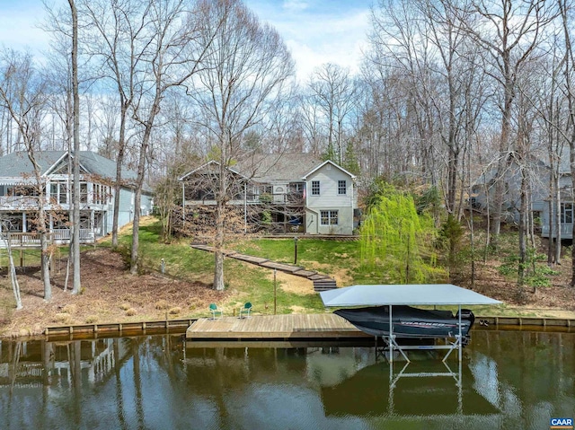 56 Wildwood Dr, Palmyra, VA 22963 - dock with a water view, boat lift, and a yard
