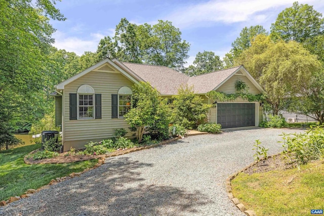 56 Wildwood Dr, Palmyra, VA 22963 - ranch-style home with driveway, a garage, and roof with shingles