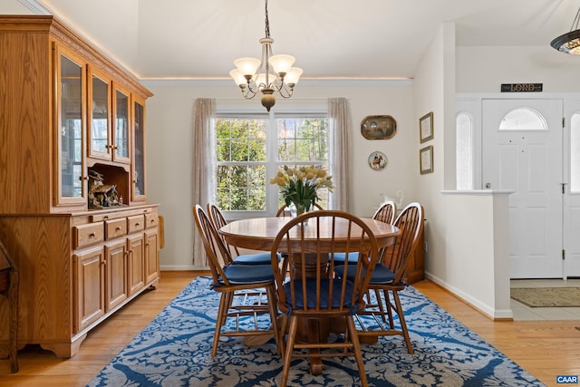 56 Wildwood Dr, Palmyra, VA 22963 - dining area featuring a chandelier, light wood-type flooring, and ornamental molding