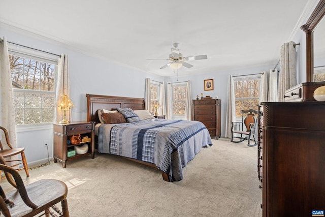 56 Wildwood Dr, Palmyra, VA 22963 - bedroom featuring light carpet, multiple windows, ornamental molding, and ceiling fan
