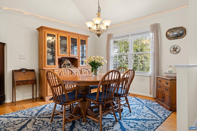 56 Wildwood Dr, Palmyra, VA 22963 - dining area with a chandelier, light wood-style flooring, and ornamental molding