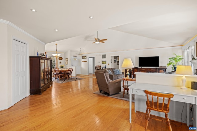 56 Wildwood Dr, Palmyra, VA 22963 - living room with light wood-style floors, lofted ceiling, ornamental molding, a ceiling fan, and a chandelier