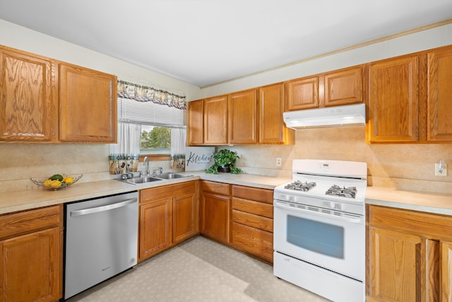816 Rutherford St, Staunton, VA 24401 - kitchen with gas range gas stove, dishwasher, under cabinet range hood, light floors, and light countertops