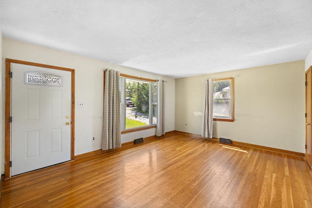 816 Rutherford St, Staunton, VA 24401 - unfurnished living room with light wood-style flooring