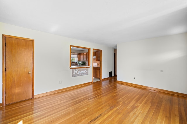 816 Rutherford St, Staunton, VA 24401 - empty room featuring light wood finished floors and baseboards