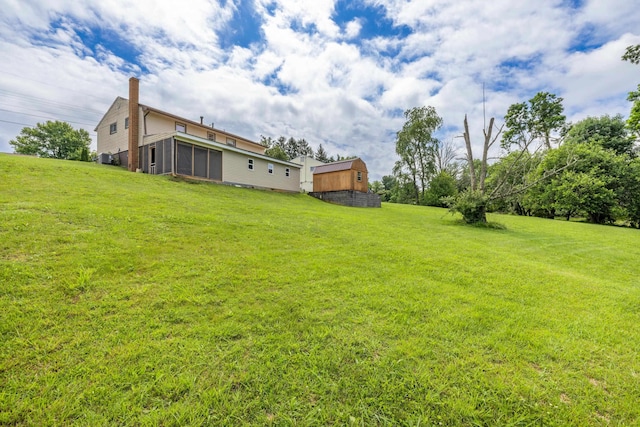 816 Rutherford St, Staunton, VA 24401 - view of green lawn featuring a sunroom and an outbuilding