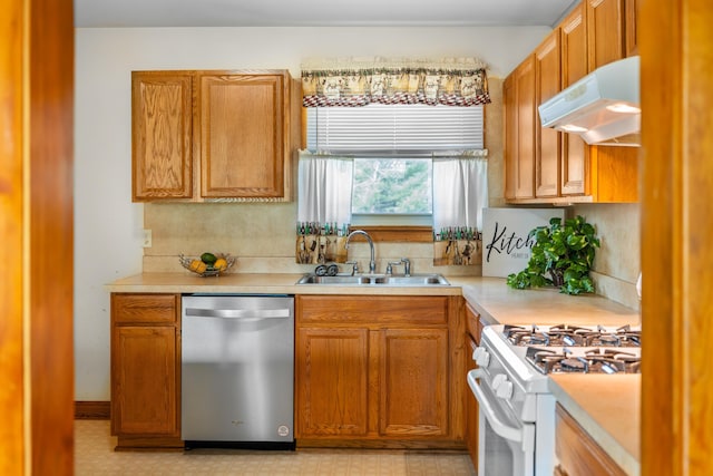 816 Rutherford St, Staunton, VA 24401 - kitchen with dishwasher, under cabinet range hood, white range with gas stovetop, light countertops, and brown cabinets