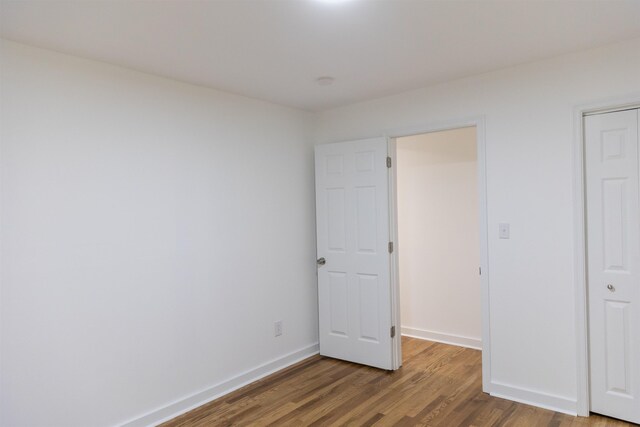 164 28th St E, Buena Vista, VA 24416 - unfurnished bedroom featuring wood finished floors and baseboards