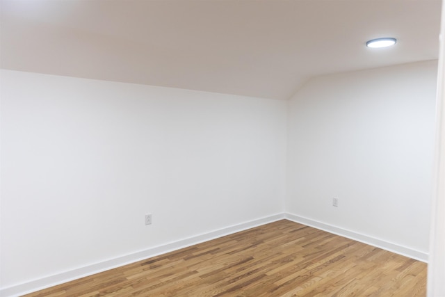 164 28th St E, Buena Vista, VA 24416 - additional living space featuring light wood-style flooring and vaulted ceiling