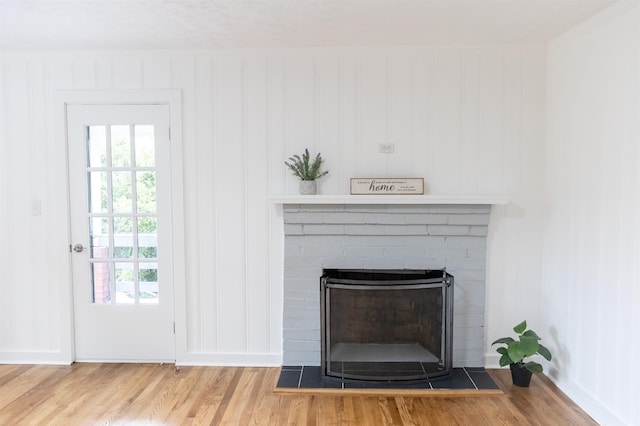 164 28th St E, Buena Vista, VA 24416 - detailed view of wood finished floors and a fireplace
