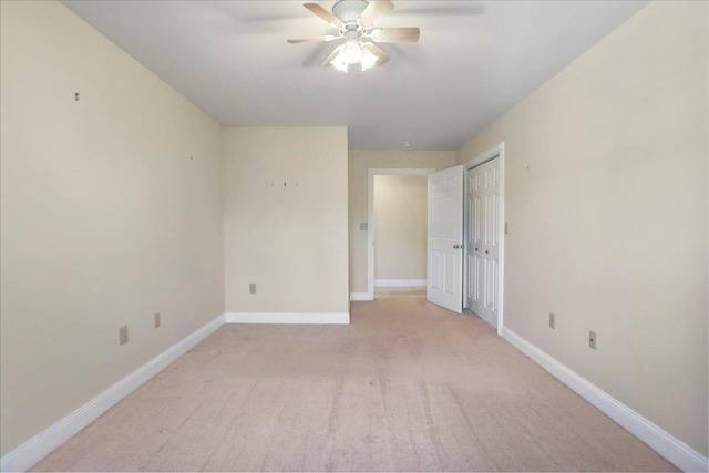 114 Meagans Run Rd, Woodstock, VA 22664 - unfurnished bedroom featuring light colored carpet, a closet, and a ceiling fan