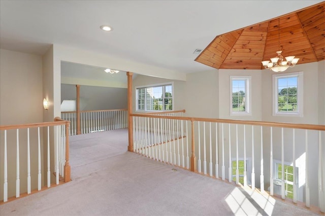 114 Meagans Run Rd, Woodstock, VA 22664 - corridor with a chandelier, plenty of natural light, carpet floors, vaulted ceiling, and recessed lighting