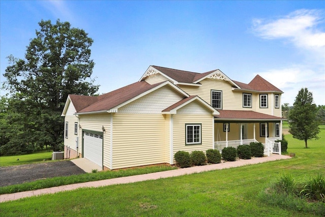 114 Meagans Run Rd, Woodstock, VA 22664 - view of front facade with covered porch, an attached garage, a front yard, and driveway