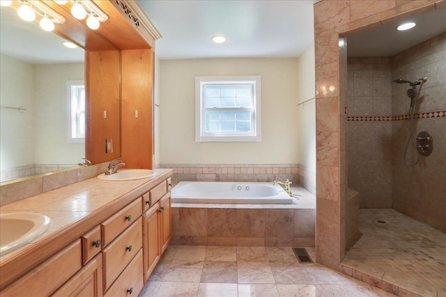 114 Meagans Run Rd, Woodstock, VA 22664 - bathroom with healthy amount of natural light, a bath, a tile shower, double vanity, and recessed lighting