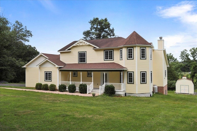 114 Meagans Run Rd, Woodstock, VA 22664 - victorian house featuring a shed, a porch, a front yard, a chimney, and roof with shingles