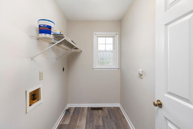laundry room featuring wood finished floors, baseboards, washer hookup, and hookup for an electric dryer