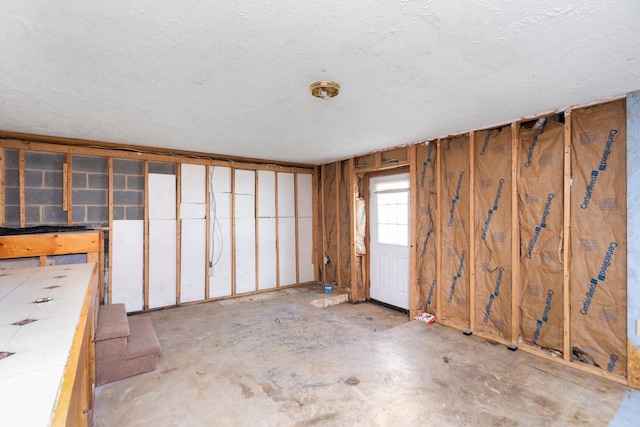 empty room featuring a textured ceiling