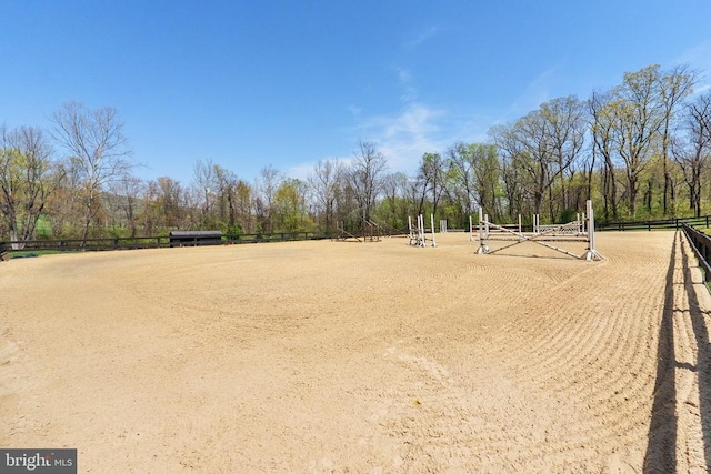  - view of community with an enclosed area and fence