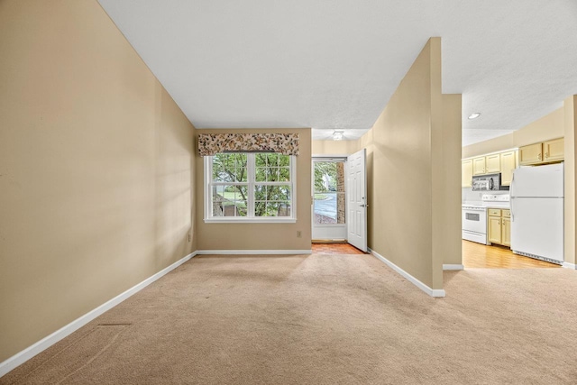 127 Emerald Dr, Harrisonburg, VA 22801 - unfurnished living room with light colored carpet and baseboards