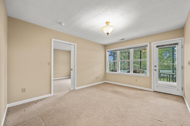 127 Emerald Dr, Harrisonburg, VA 22801 - spare room with plenty of natural light, carpet flooring, baseboards, a smoke detector, and a textured ceiling