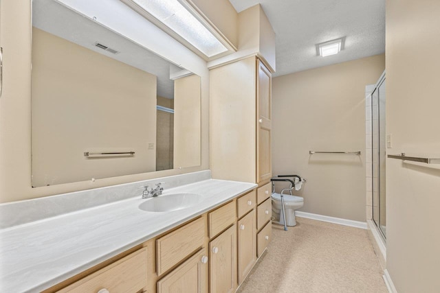 127 Emerald Dr, Harrisonburg, VA 22801 - full bath featuring toilet, vanity, a shower stall, a textured ceiling, and baseboards