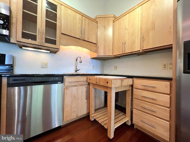 243 Aaron Mountain Rd, Castleton, VA 22716 - kitchen with stainless steel appliances, light brown cabinetry, dark wood-style floors, and glass insert cabinets