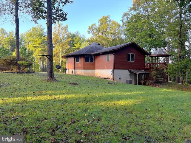 243 Aaron Mountain Rd, Castleton, VA 22716 - view of property exterior featuring a yard, central air condition unit, and a gazebo