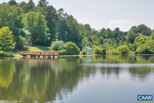 view of water feature featuring a forest view