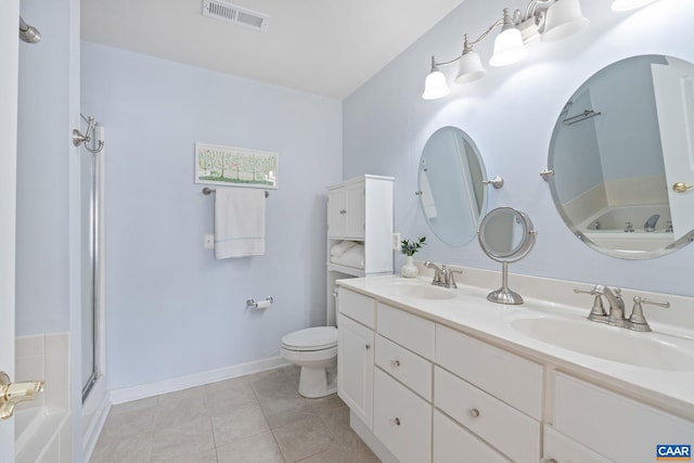 bathroom with a sink, toilet, visible vents, and tile patterned floors