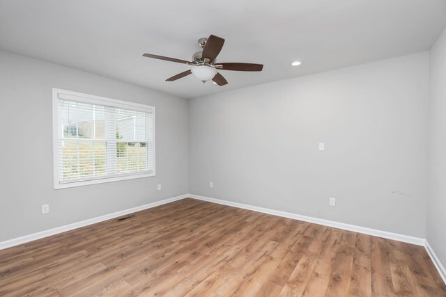 121 Lake View Cir, Waynesboro, VA 22980 - empty room with wood finished floors, visible vents, baseboards, and ceiling fan