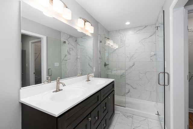 121 Lake View Cir, Waynesboro, VA 22980 - bathroom with marble finish floor, a shower stall, a spacious closet, and a sink